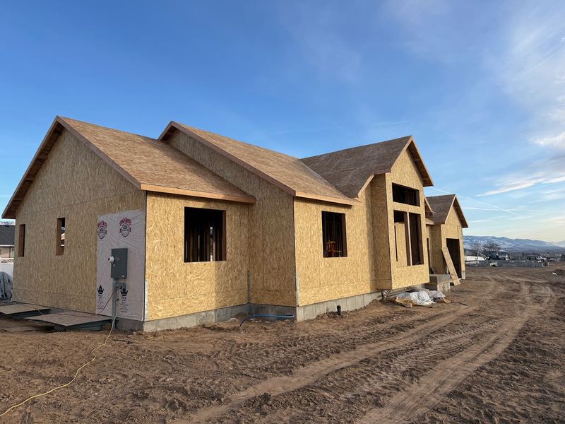 Framed and sheathed home ready for roofing and siding
